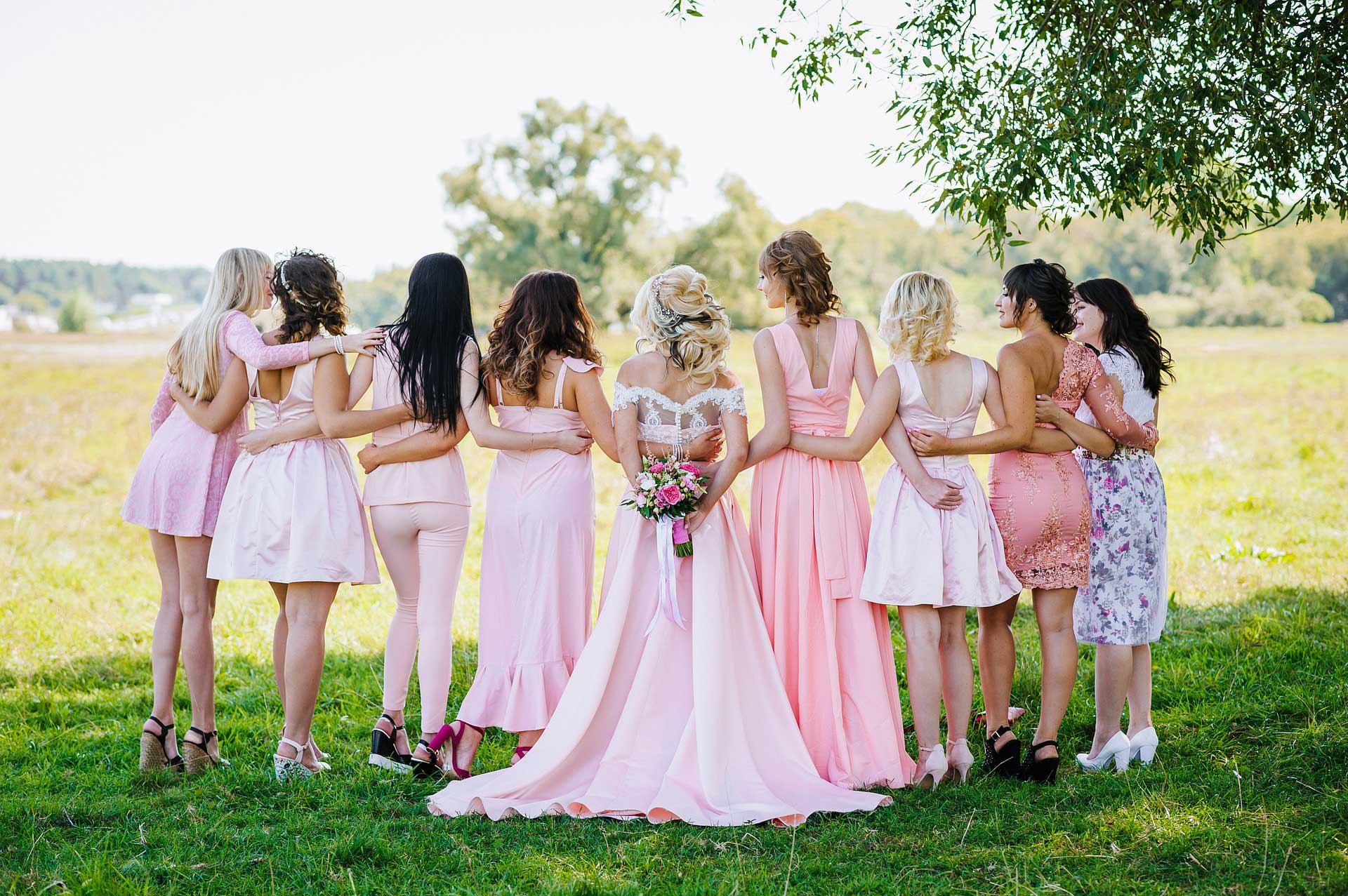 Mixed match bridesmaid dresses in pink colour