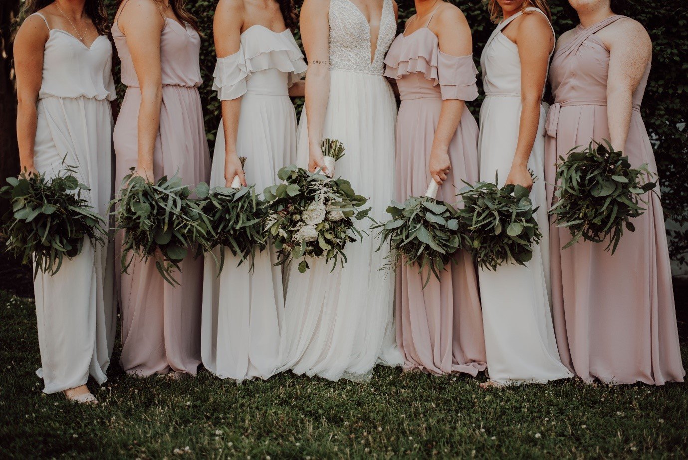 Bridal squad with bouquet