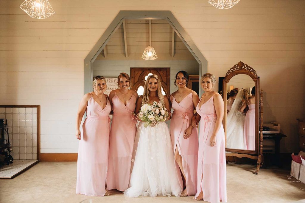 <strong>Featuring:</strong> Lucinda Pearl Chiffon Maxi Wrap Dress in Pink colour